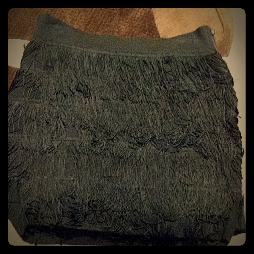 Short black skirt with fringe